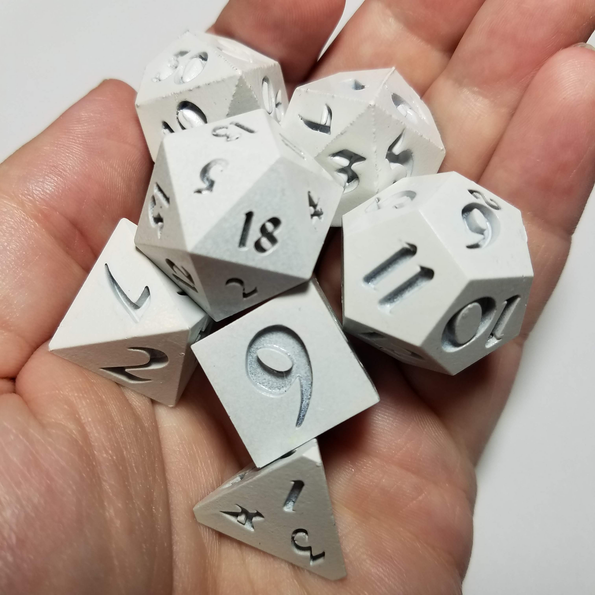 Larger D20 dice fit in the palm of your hand.